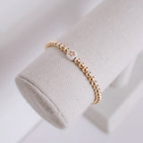 gold beaded symbol bracelet